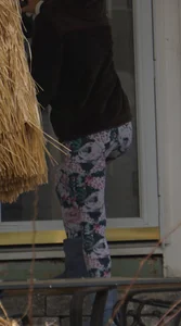 Skinny teen neighbor raking leaves in tight floral patterned leggings