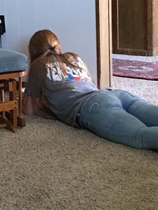 Teen in Tight Jeans Lying on the Floor Home Creepshot