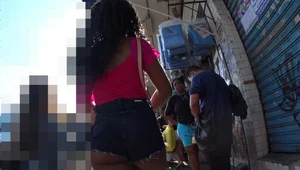 Sexy black milf walking with a great ass in short jean shorts showing her ass cheaks