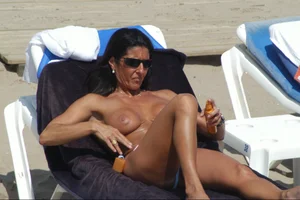 Girls on a nude beach in Sitges, Spain