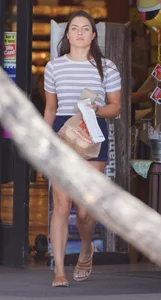 Hot brunette with a great ass in tight denim shorts