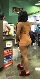 Latina with hard nipples and a big booty in tight spandex shorts outfit