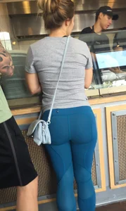 Hottie with a nice booty in tight teal leggings