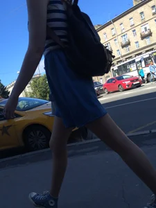 Girl in a Skirt With Sexy Skinny Legs Walking Down a Street Creepshots Collection
