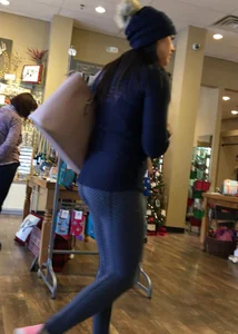 Brunette jewelry shopping in leggings with a nice ass