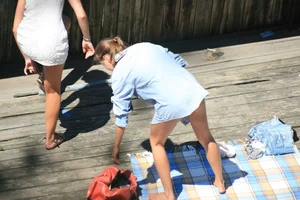 Two teens stripping and going topless to tan