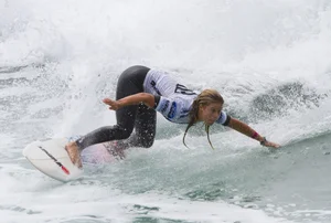 Candid surfer babes on the beach and in bikinis