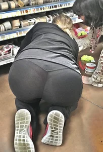 Chubby Girl Standing on Her Knees Doggy Style Looking for Stuff on the Floor of the Supermarket