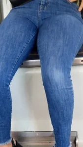 Hot candid milf in tight blue jeans sitting in a public bus