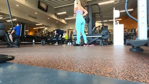 Gym blonde in turquoise leggings notices me and doesn’t mind, even moves in front of me later for some close-ups