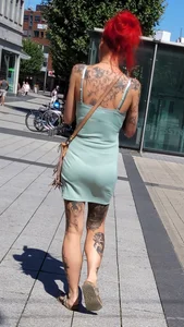 Candid Girl in Short Dress With a Tattooed Body Street Creepshots Gallery