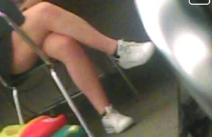 Crossed Chunky Legs And Feet in Sneakers