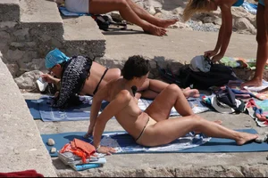 Nude girls on a beach in Hvar, Croatia