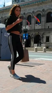 Redhead in black spandex in the sun