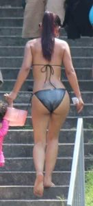 Sexy brunette milf in a bikini with a great body, nice ass and some camel toe