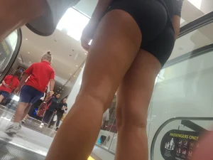 College gym chick on the escalator