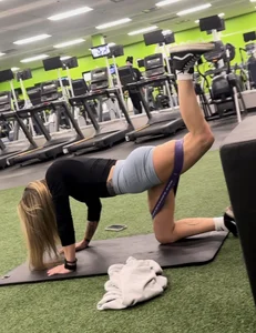 Petite blonde with bubble butt in blue spandex shorts