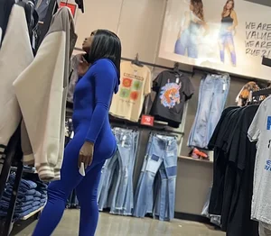 Thick mesmerizing ebony in a tight blue one piece