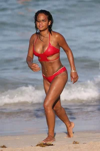 Christina Milian in red bikini in Miami with hard nipples