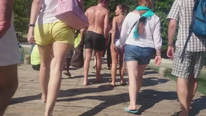 Milf in yellow shorts with vpl and a wedgie