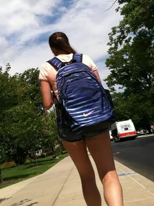 Hot college girl in little jean shorts showing some cheeks and legs