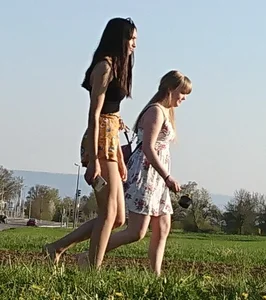 Talking to two cute candid German girls in shorts