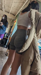 Slender asian teen oblivious at the cafe
