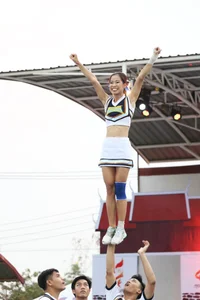 Bunch of athletic Thai cheerleaders at a competition