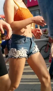Girl in Mini Shorts and Top Street Creepshot - Sexy Legs