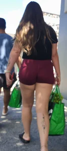 PAWG in incredible lighting and tiny tight shorts. Visible thong line and feet. Thick thighs and calf tatts. (OC)