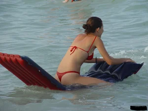 Beach voyeur girls in bikinis, thongs and topless