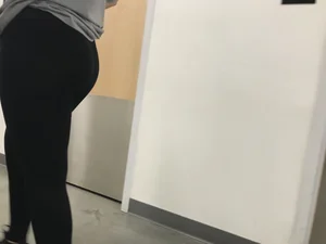 Sexy Amazon employee in leggings with a nice ass