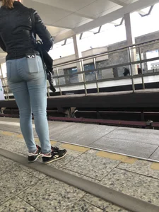 Cute Young Girl in Tight Blue Jeans And Leather Jacket Subway Creepshots