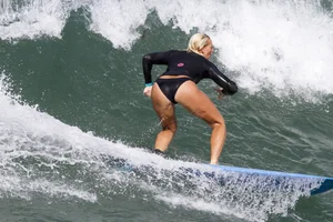 Candid surfer babes on the beach and in bikinis