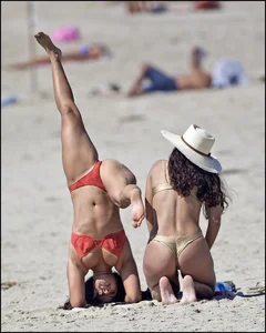 Sexy girls at the beach in thongs and bikinis with nice asses