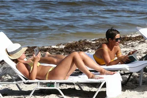 Frankie Bridge nip slips in a bikini on the beach