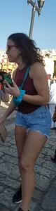 Laughing girl in shorts, legs and thick peach