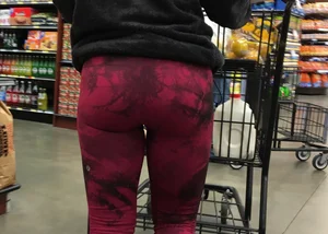Milf grocery shopping in red leggings with a great ass