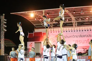 Bunch of athletic Thai cheerleaders at a competition