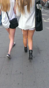 Street girlfriends in short dresses