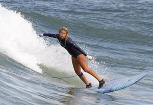 Candid surfer babes on the beach and in bikinis