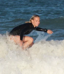 Hot surfer chicks out in the water