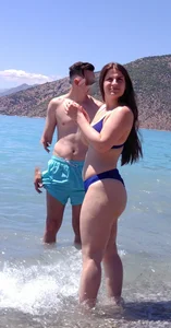 Thick lady at the beach in little blue bikini with big ass