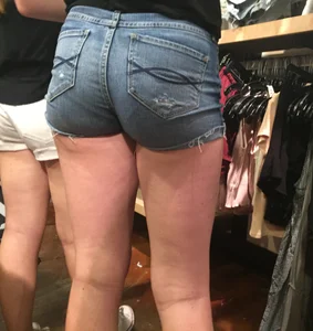 Great Round Ass in Tight Denim Jeans and Hot Bare Legs - Store Closeup Creepshots Gallery