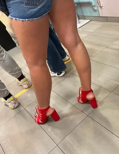 Girl in red shoes