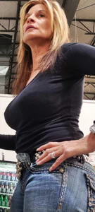 Milf in jeans shopping with big tits
