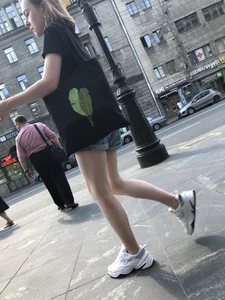 Candid Teen in Denim Shorts And Sneakers With Slim Legs Street Photos