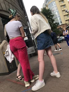 Street Candid Girl in a Denim Skirt and Sneakers Hot Legs Creepshots