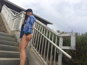 Blue thong beach babe walking up the stairs