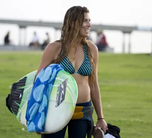 Candid surfer babes on the beach and in bikinis